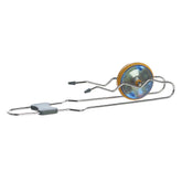 Educational magnetic toy Rail Twirler by Aurora Toys with a spinning wheel on a track, demonstrating magnetic forces.